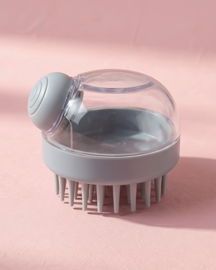 MELLINA scalp massage shampoo brush in grey, studio photograph