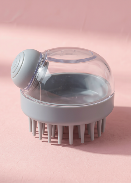 MELLINA scalp massage shampoo brush in grey, studio photograph