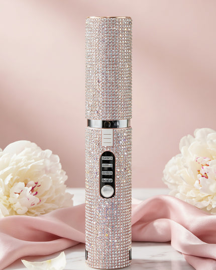 MELLINA Sparkle cordless rhinestone straightener and curler on marble with pink silk and peonies